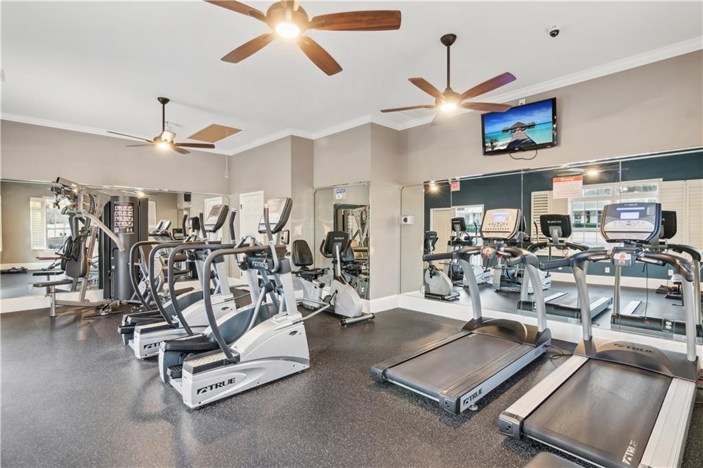 2735 Gateview Court Cumming, GA 30040 - Photo 34 of 35 a view of a room with gym equipment