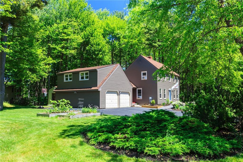 27 Cheverus Road Cape Elizabeth, ME 04107 - Photo 2 of 31 The large yard is well landscaped...