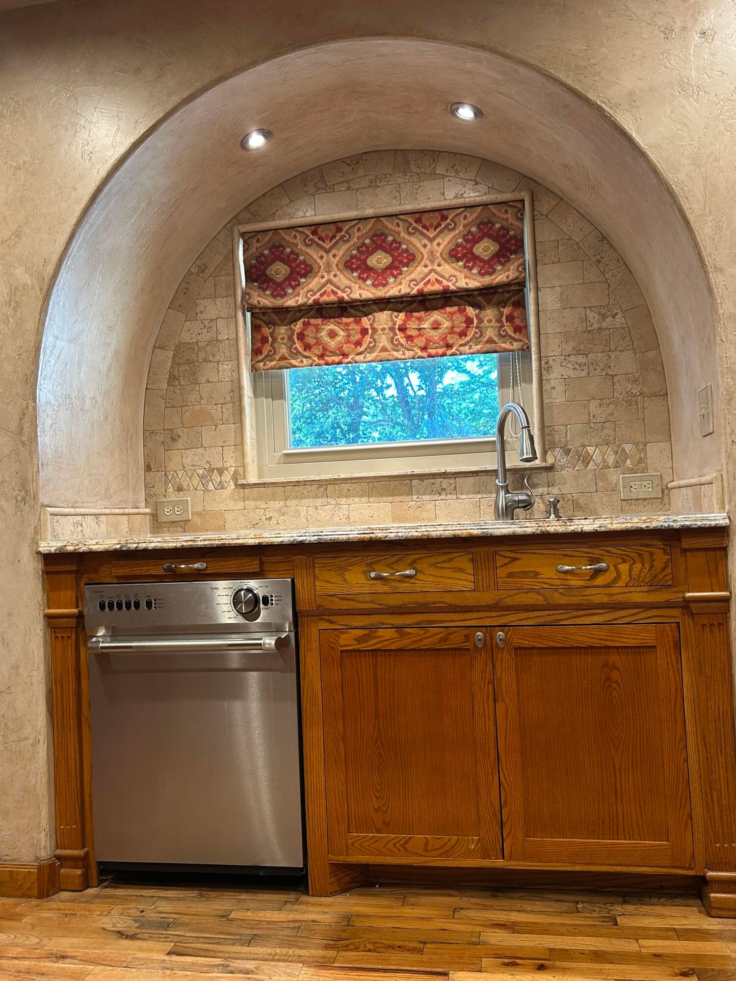 615 South 6th Street Canadian, TX 79014 - Photo 6 of 56 a view of a kitchen with granite countertop cabinets and a stove