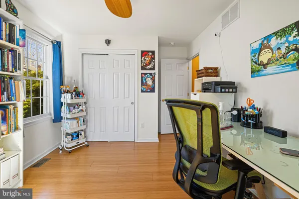 a view of a workspace with furniture and toys