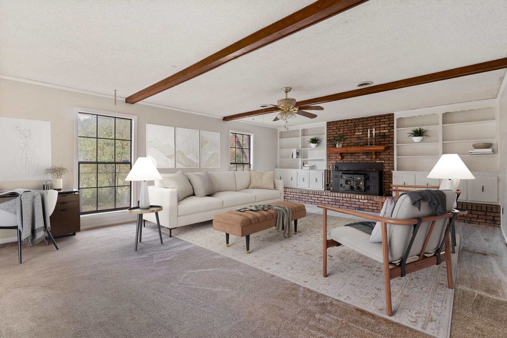 5034 Quince Road Memphis, TN 38117 - Photo 11 of 25 a living room with furniture and a fireplace