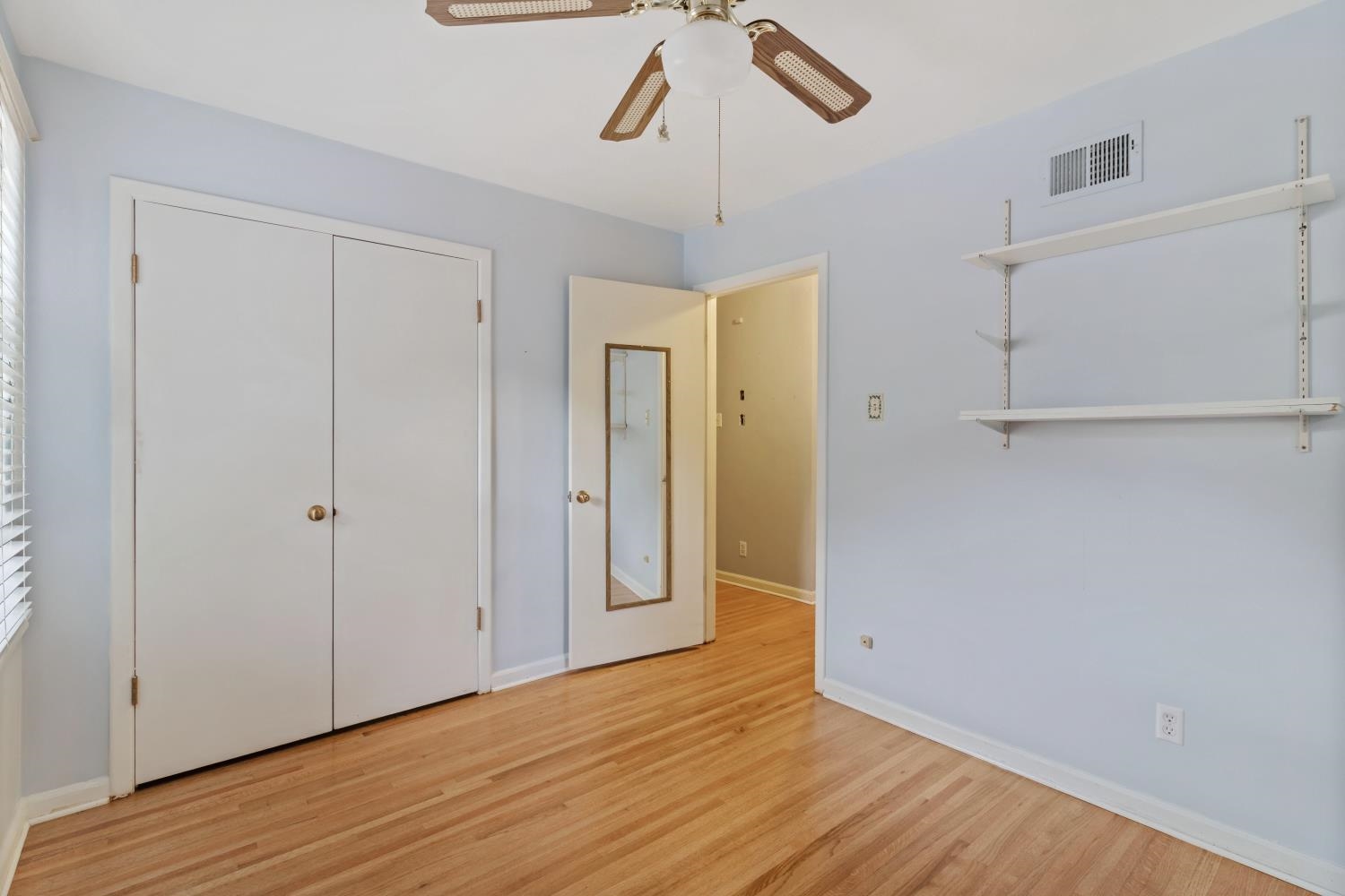 5034 Quince Road Memphis, TN 38117 - Photo 21 of 25 a view of empty room with wooden floor