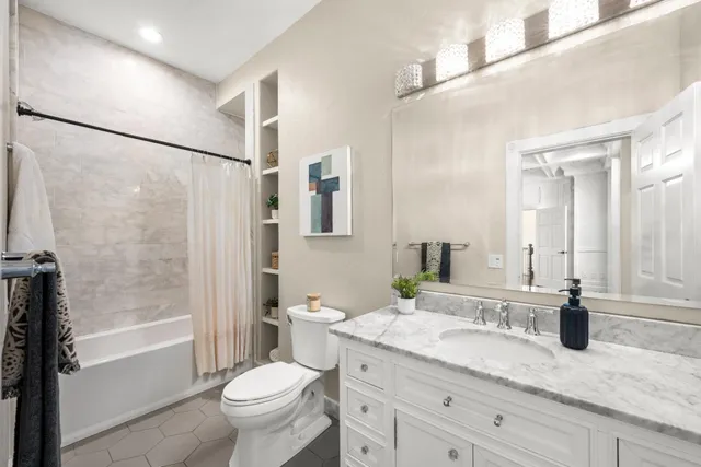 a view of a house with backyard sitting area and garden