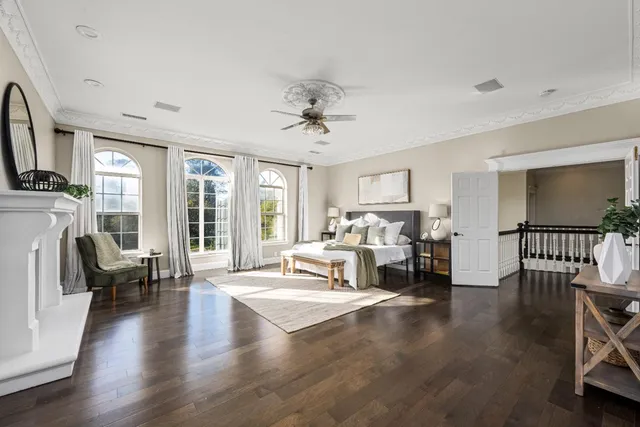 an aerial view of a house with a yard and garden