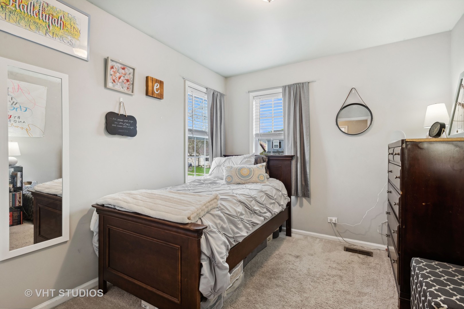 27W252 Churchill Road Winfield, IL 60190 - Photo 8 of 18 a bedroom with a bed and a window