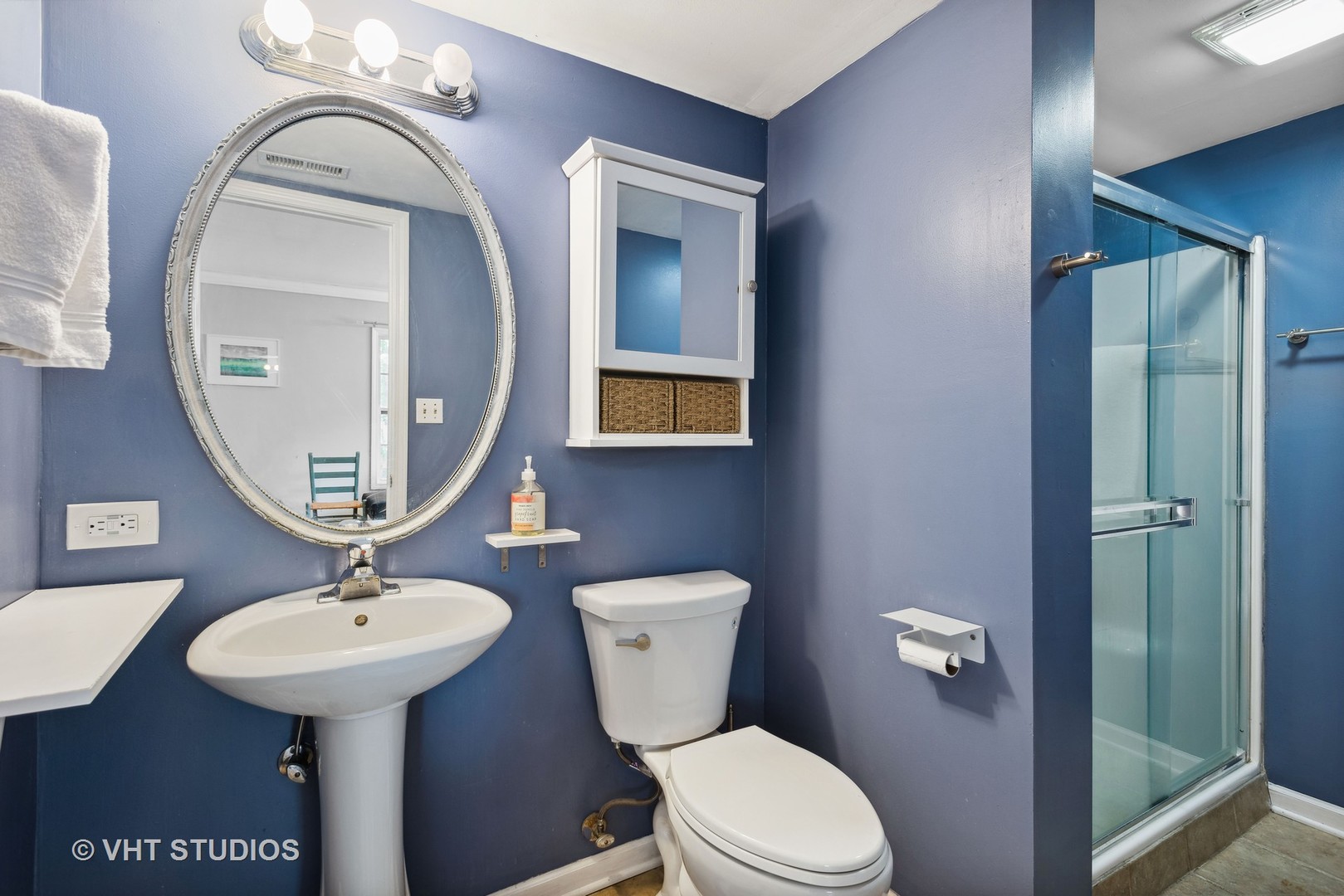 27W252 Churchill Road Winfield, IL 60190 - Photo 10 of 18 a bathroom with a toilet a sink and mirror