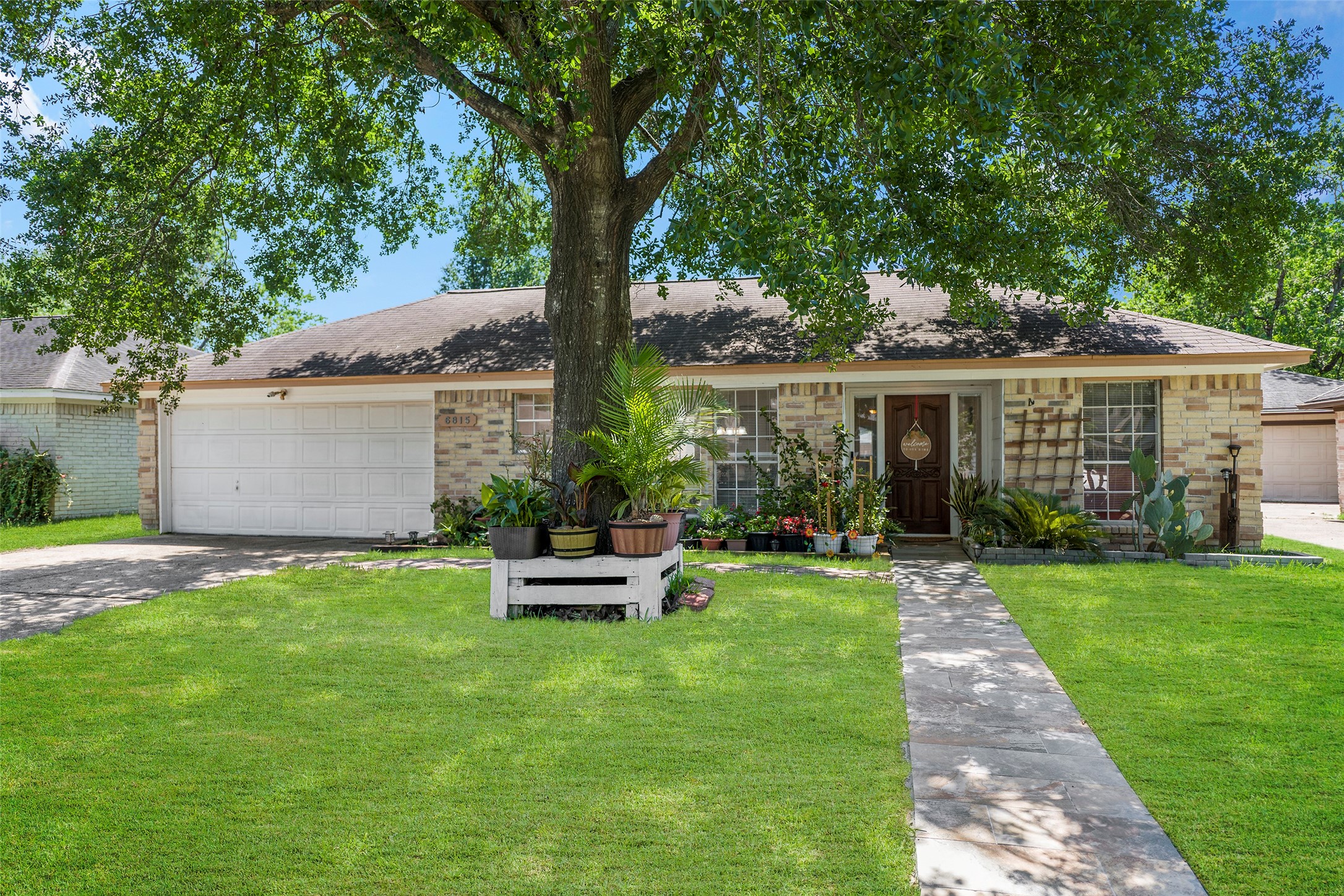 6815 River Mill Drive Spring, TX 77379 - Photo 1 of 33 a view of a house with a yard and sitting area
