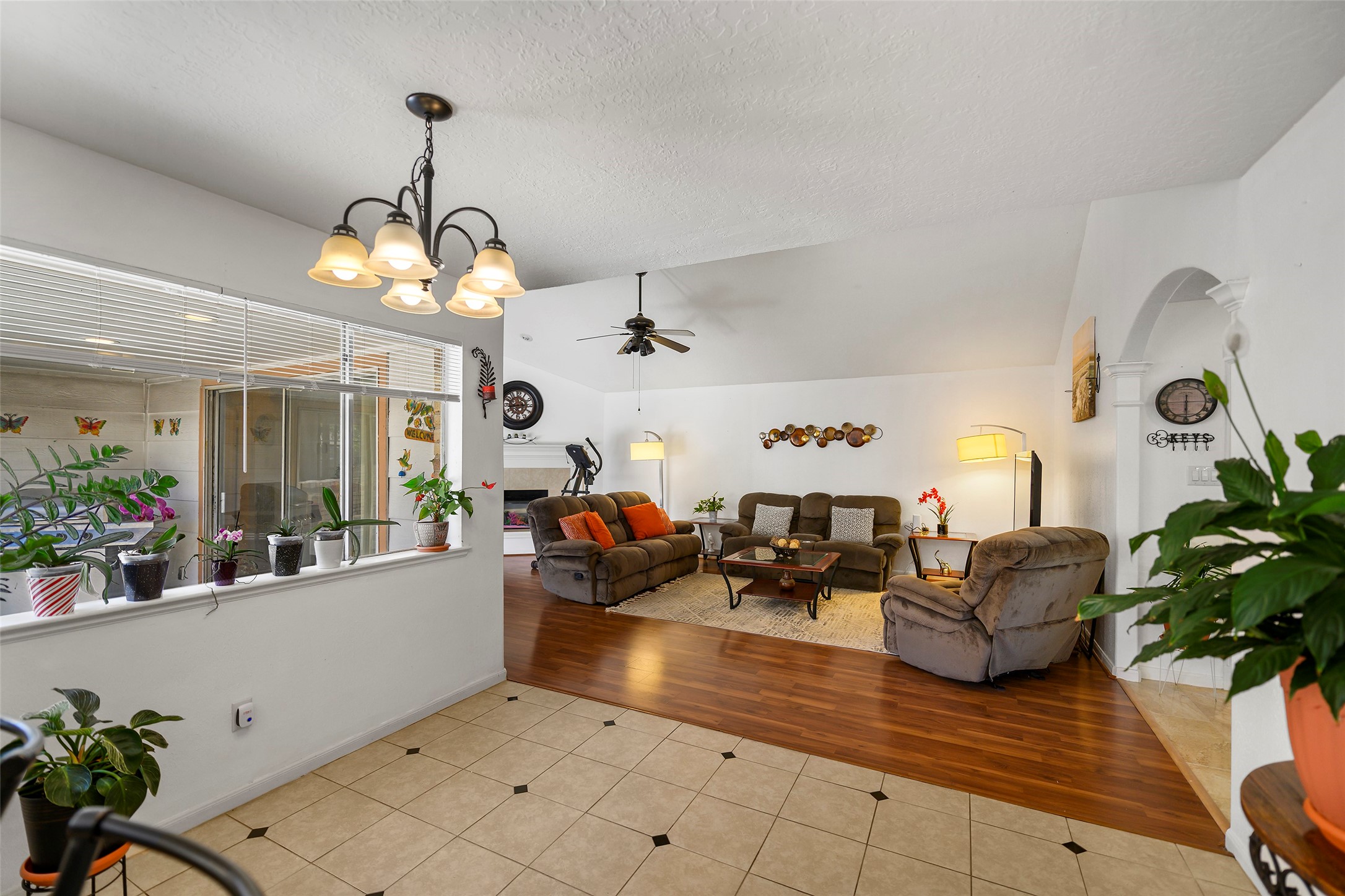 6815 River Mill Drive Spring, TX 77379 - Photo 12 of 33 a living room with furniture chandelier and a chandelier