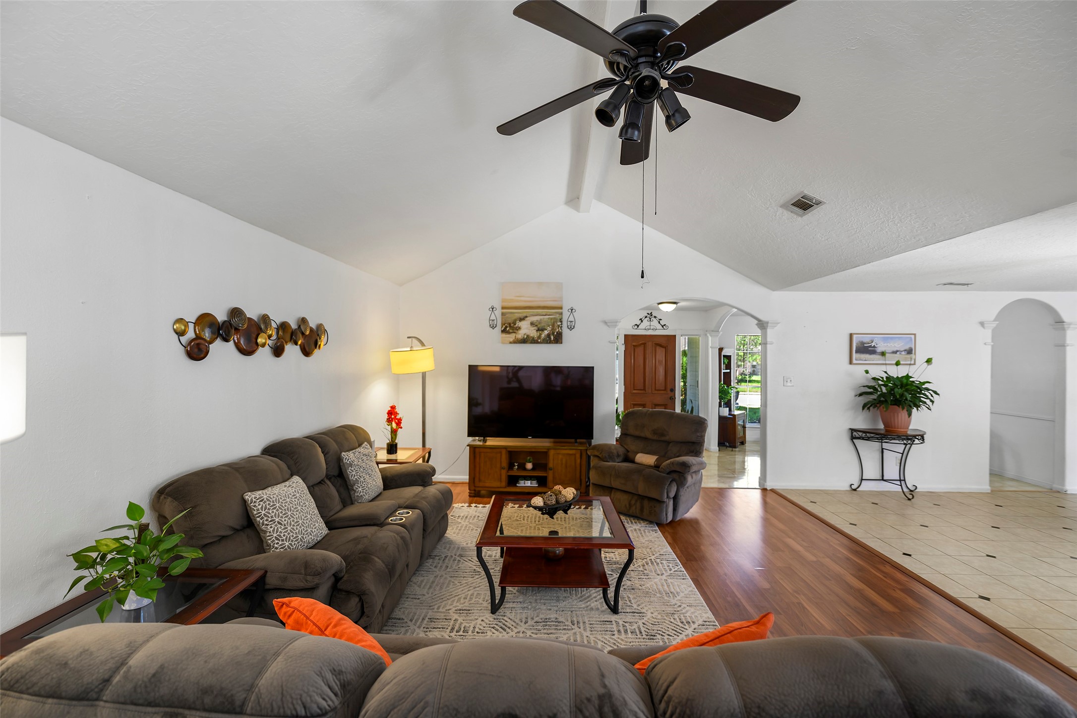 6815 River Mill Drive Spring, TX 77379 - Photo 13 of 33 a living room with furniture and a flat screen tv