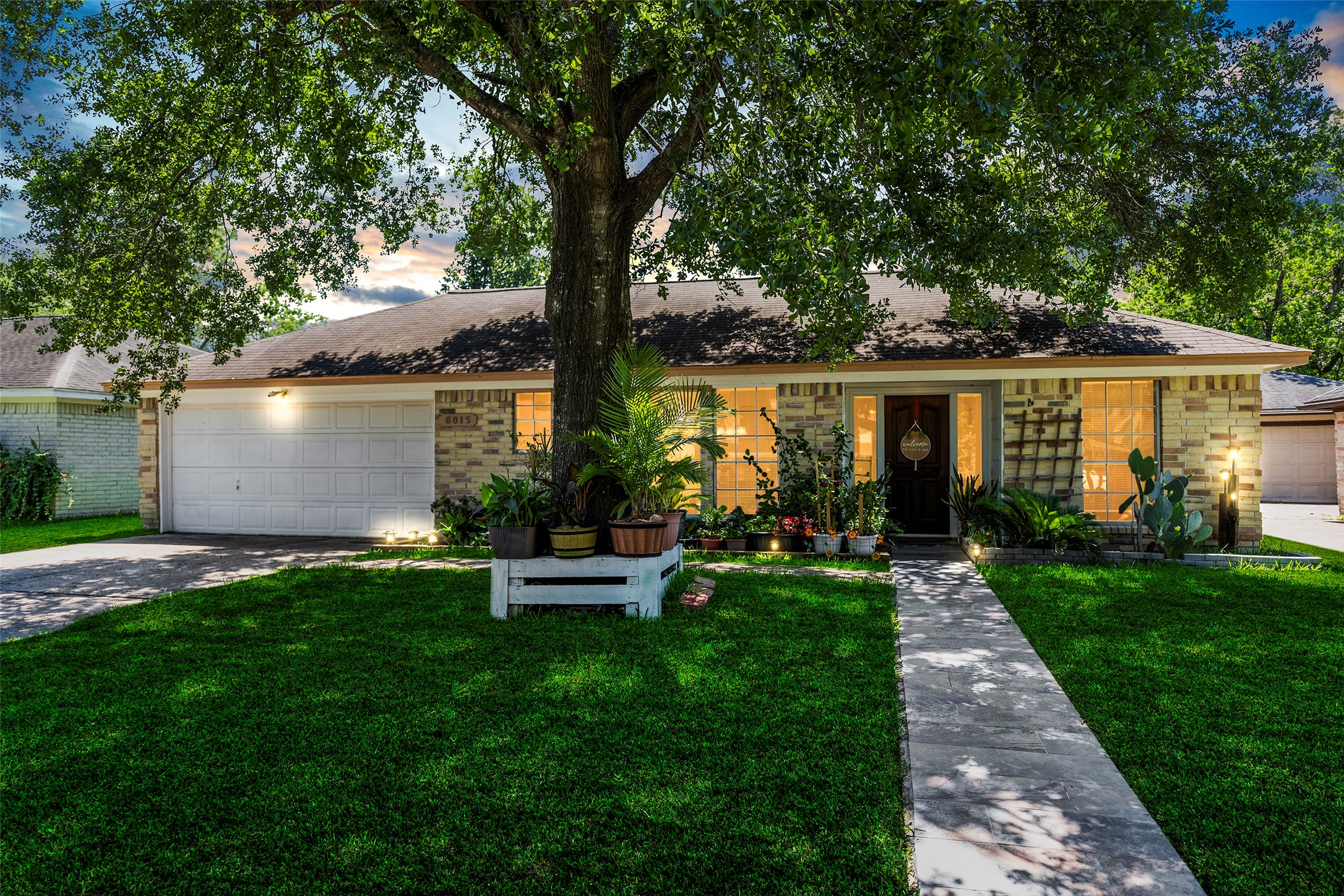 6815 River Mill Drive Spring, TX 77379 - Photo 2 of 33 a view of an house with backyard space and garden
