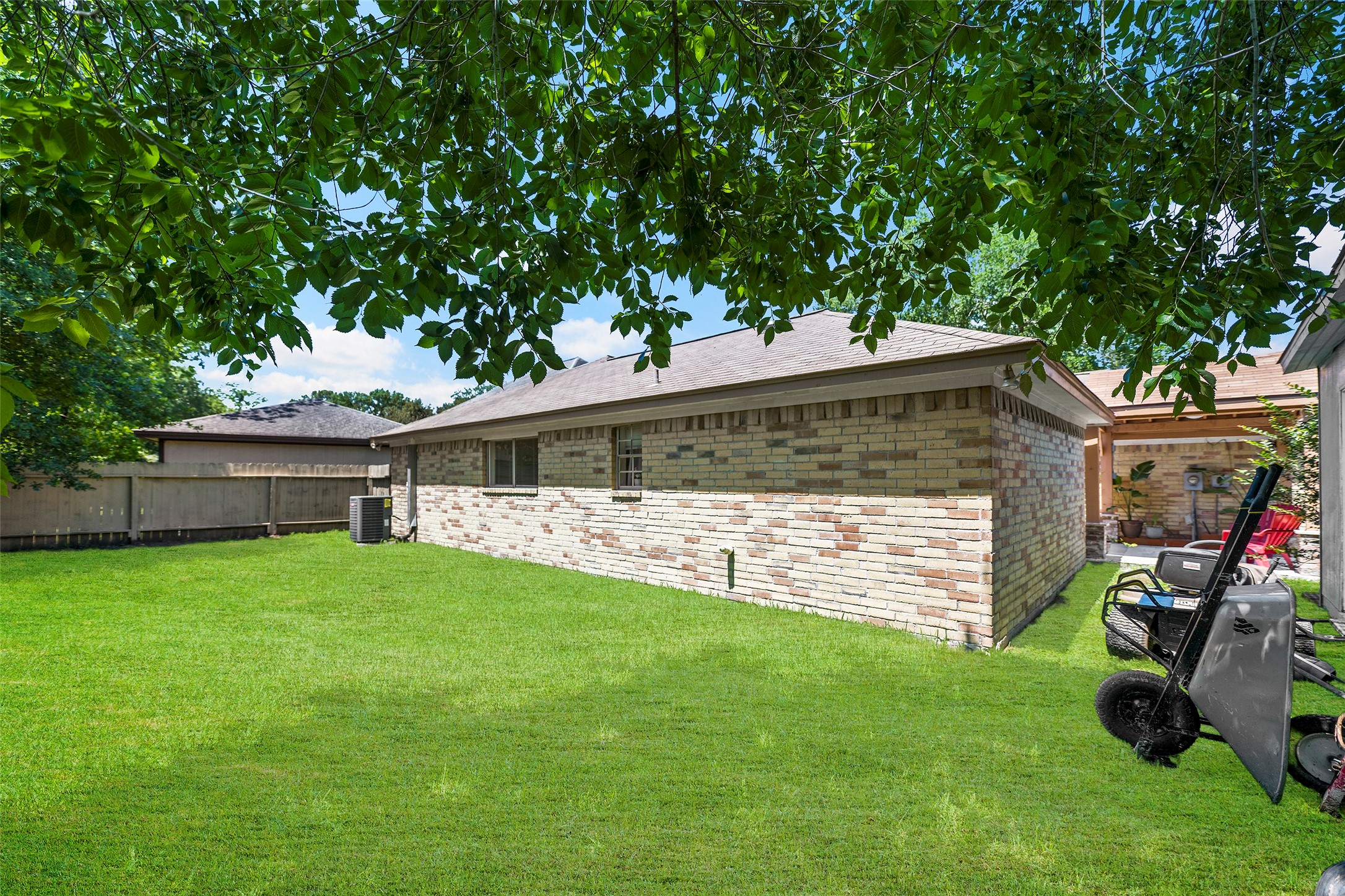 6815 River Mill Drive Spring, TX 77379 - Photo 22 of 33 a view of a house with a yard