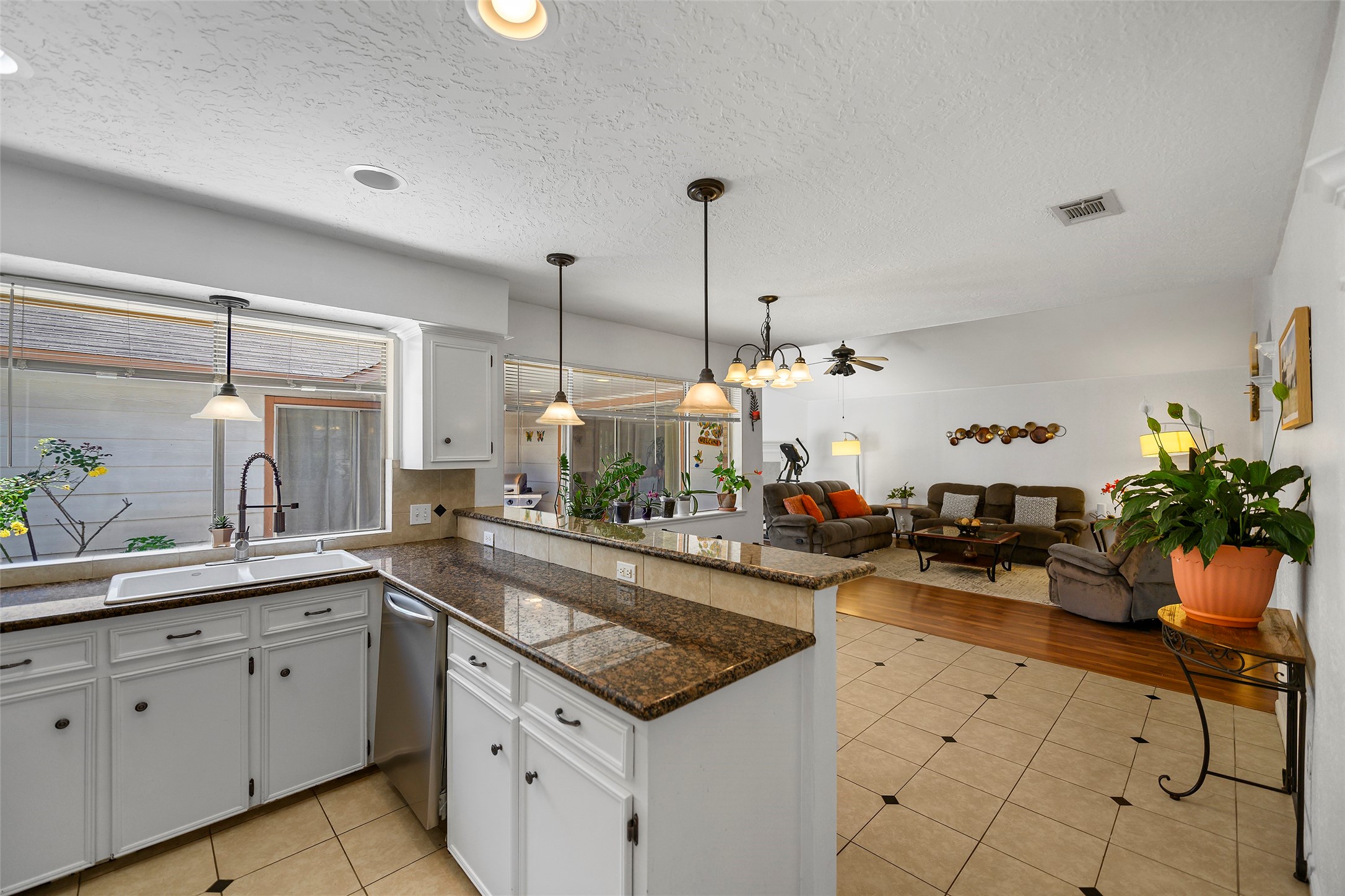 6815 River Mill Drive Spring, TX 77379 - Photo 10 of 33 a kitchen with sink and cabinets