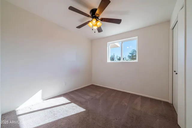 a view of an empty room with window