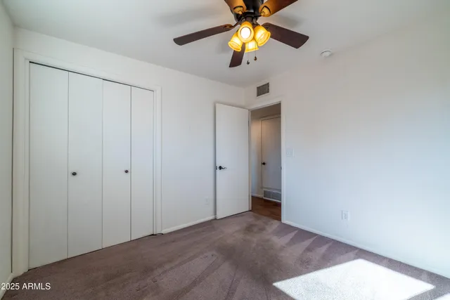 a view of a livingroom with a flat screen tv