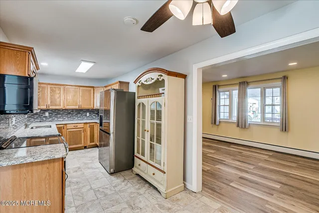a view of a bathroom with a tub and a sink