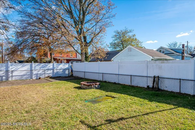 a view of a backyard with a small pool