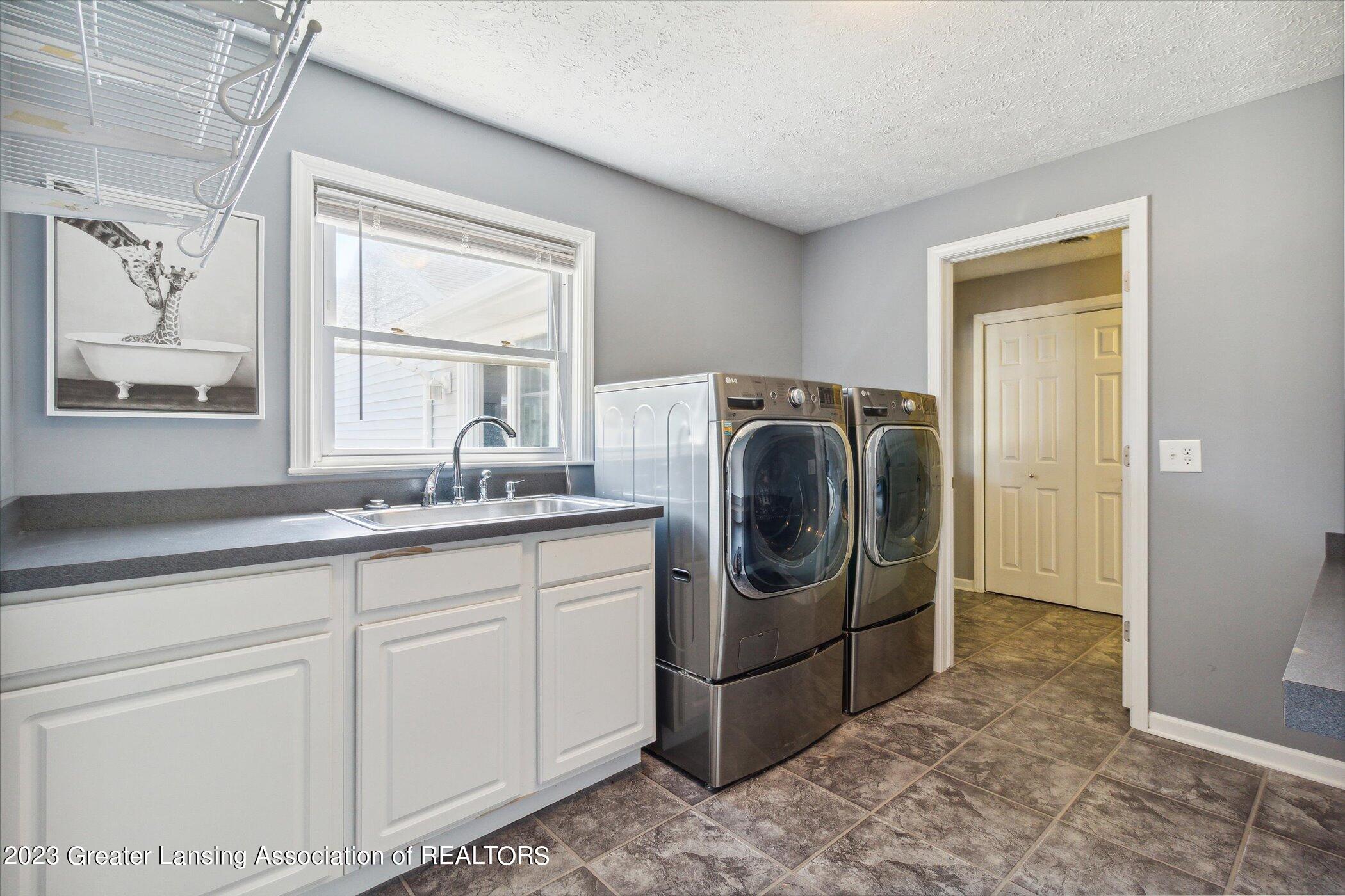 7866 East Greenfield Road Lansing, MI 48917 - Photo 27 of 50 Laundry Room