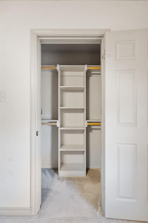 1004 North Cates Street Decatur, TX 76234 - Photo 15 of 30 a view of walk in closet with empty racks
