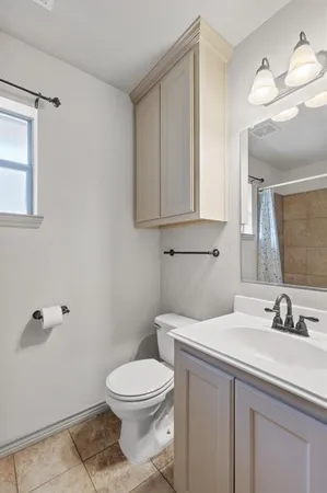 a bathroom with a shower and a bathtub