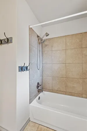 a bathroom with a sink vanity and a mirror