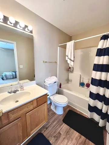 a view of a livingroom with a staircase