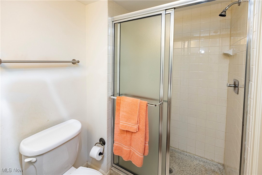 22701 Center Ridge Road, Unit 307 Rocky River, OH 44116 - Photo 22 of 27 Full bath with a stall shower and toilet