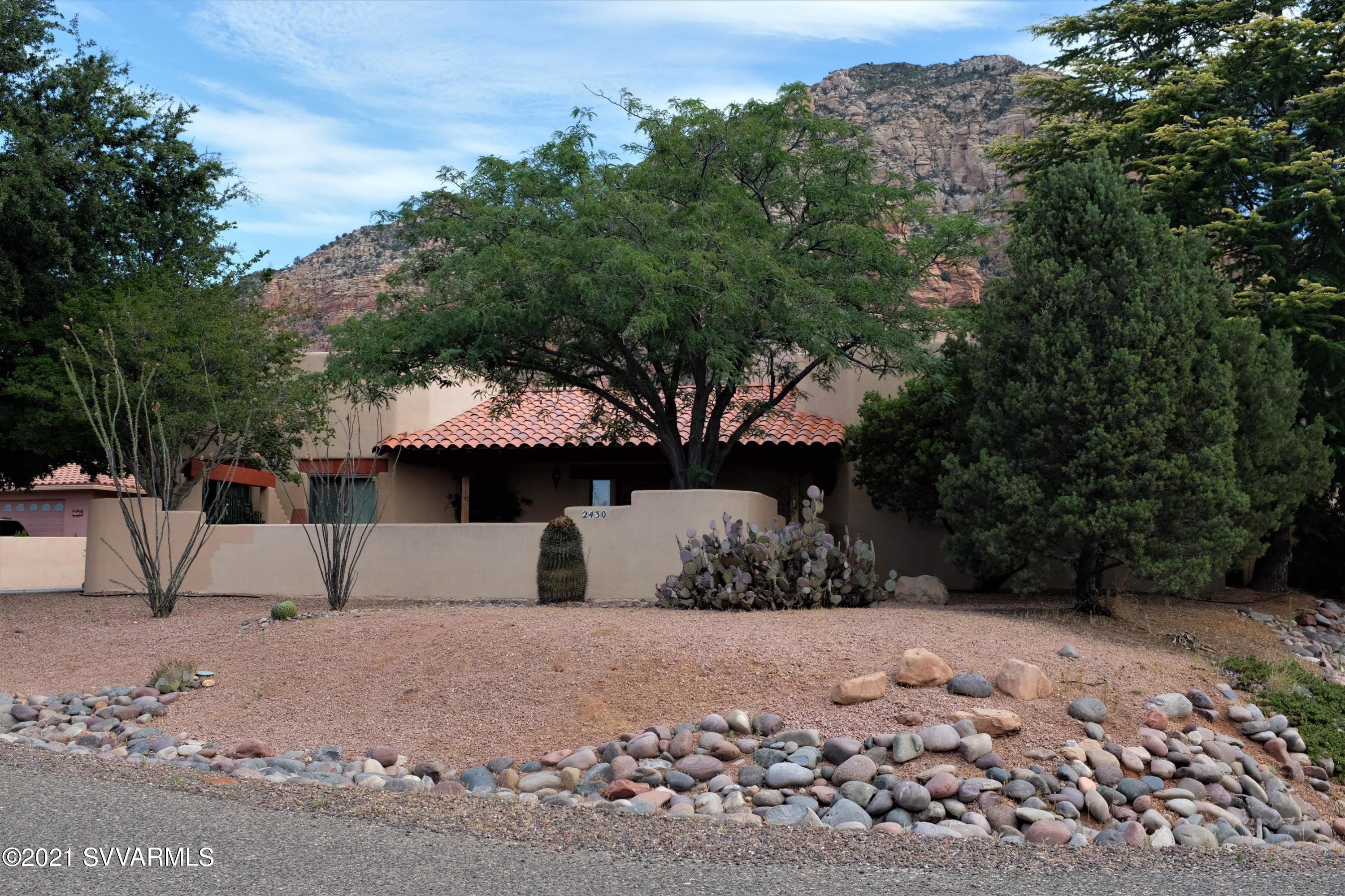 2430 Ranch Road Sedona, AZ 86336 - Photo 58 of 58 Front of home in the summer.