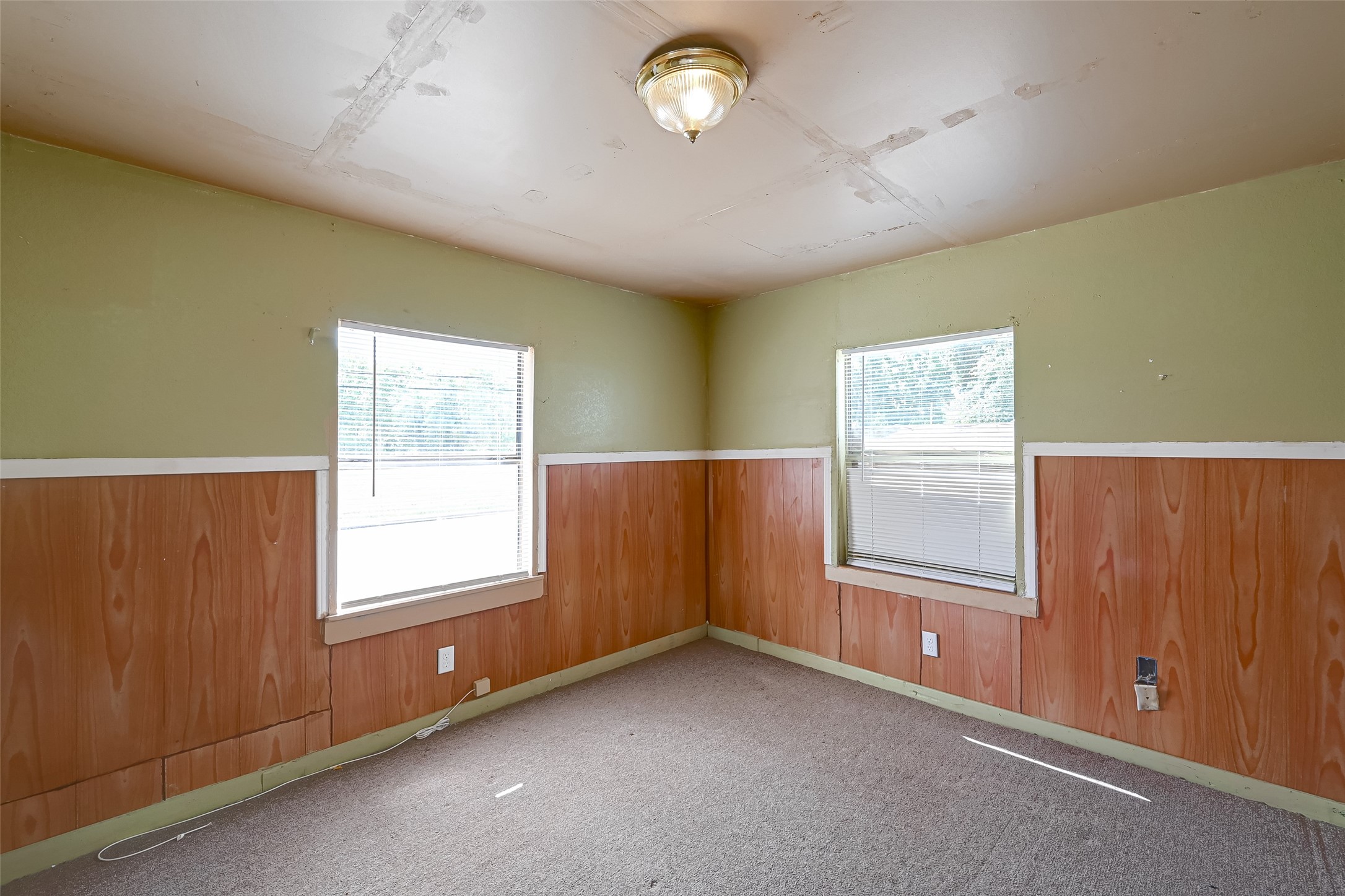 803 Mattie Street Wharton, TX 77488 - Photo 11 of 31 an empty room with windows