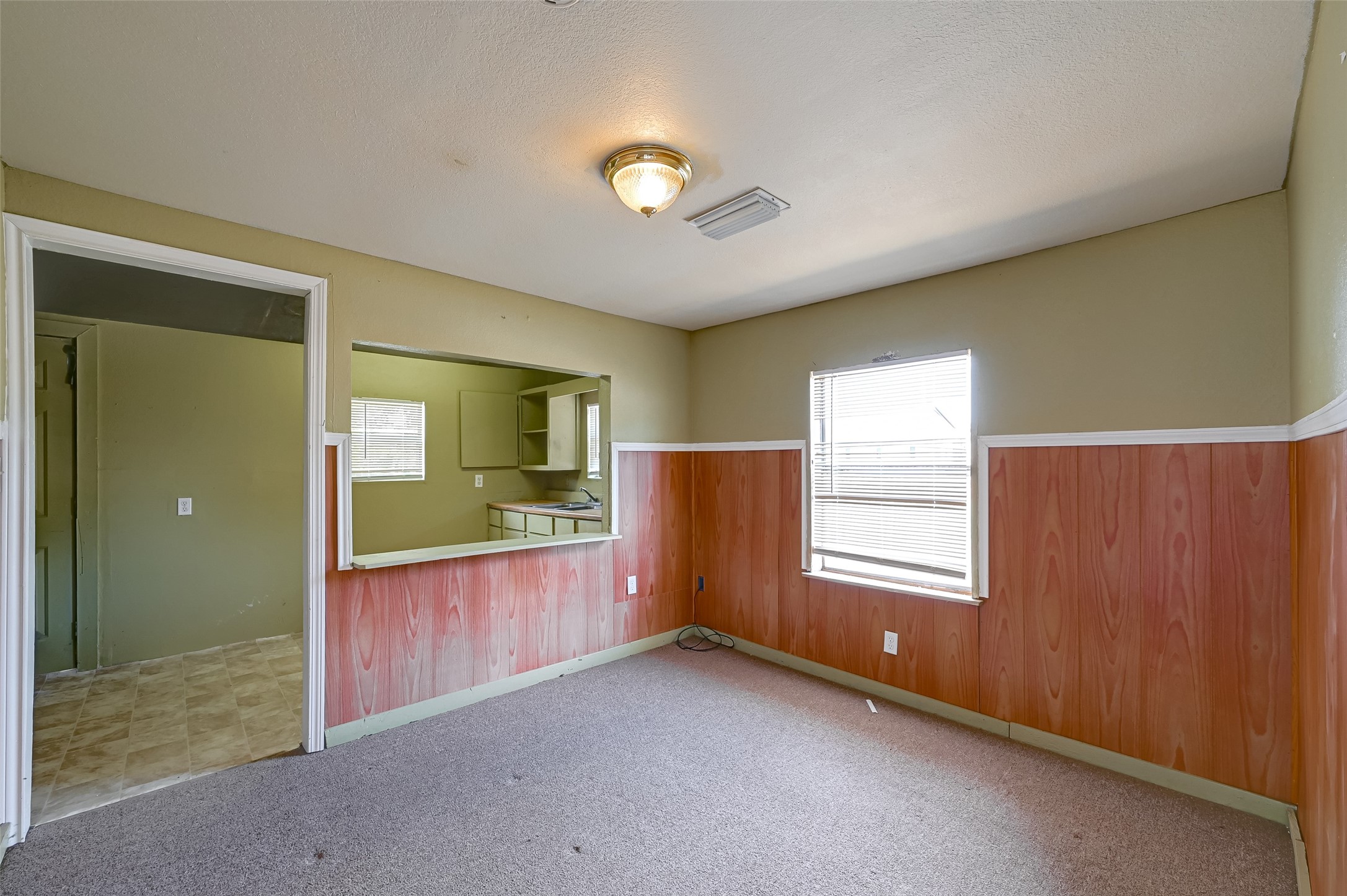 803 Mattie Street Wharton, TX 77488 - Photo 13 of 31 a view of an empty room and window
