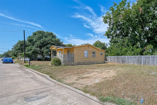 a house view with a outdoor space