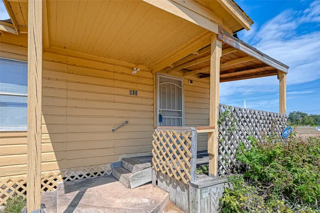 an empty room with closet area