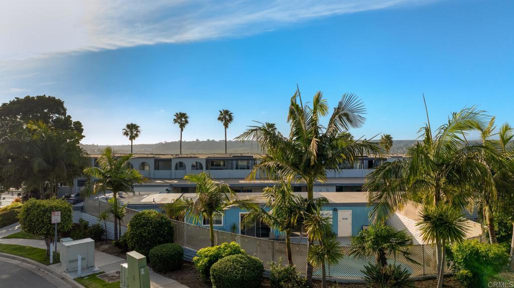 3606 Vista Rey, Unit 46 Oceanside, CA 92057 - Photo 31 of 32 a view of multiple house with a yard