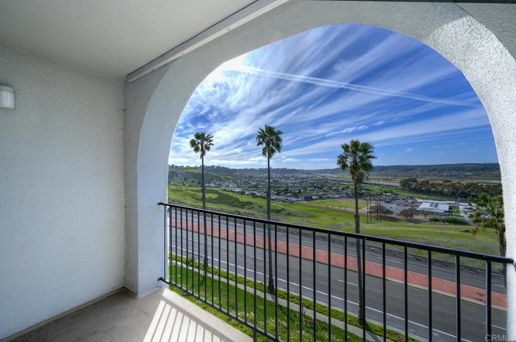 3606 Vista Rey, Unit 46 Oceanside, CA 92057 - Photo 5 of 32 a view of a porch and a yard