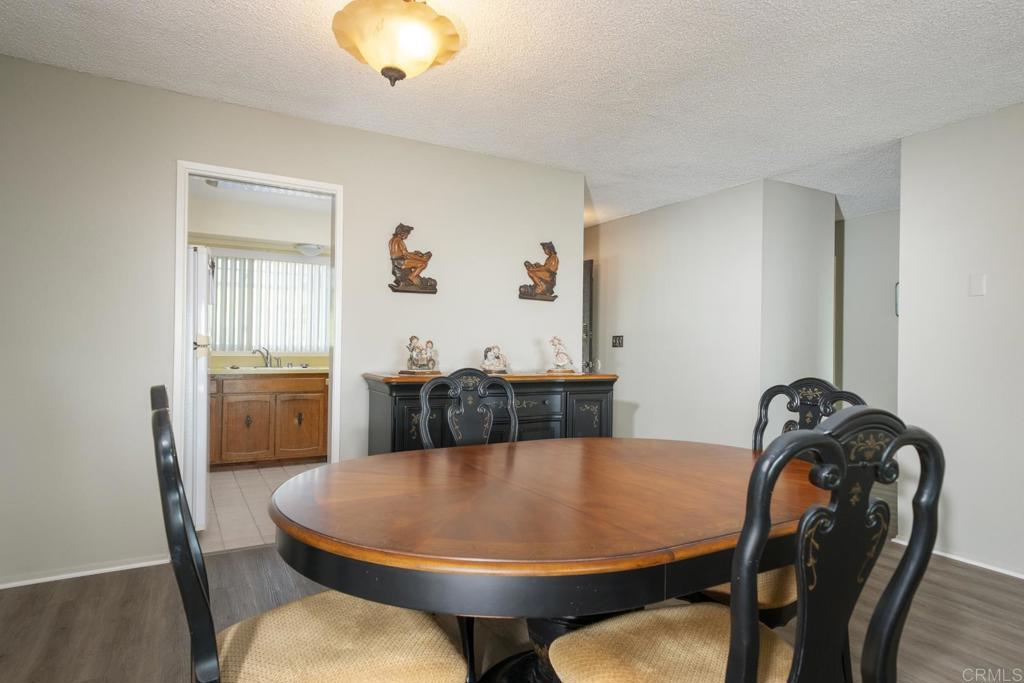 3606 Vista Rey, Unit 46 Oceanside, CA 92057 - Photo 9 of 32 a view of a dining room with furniture