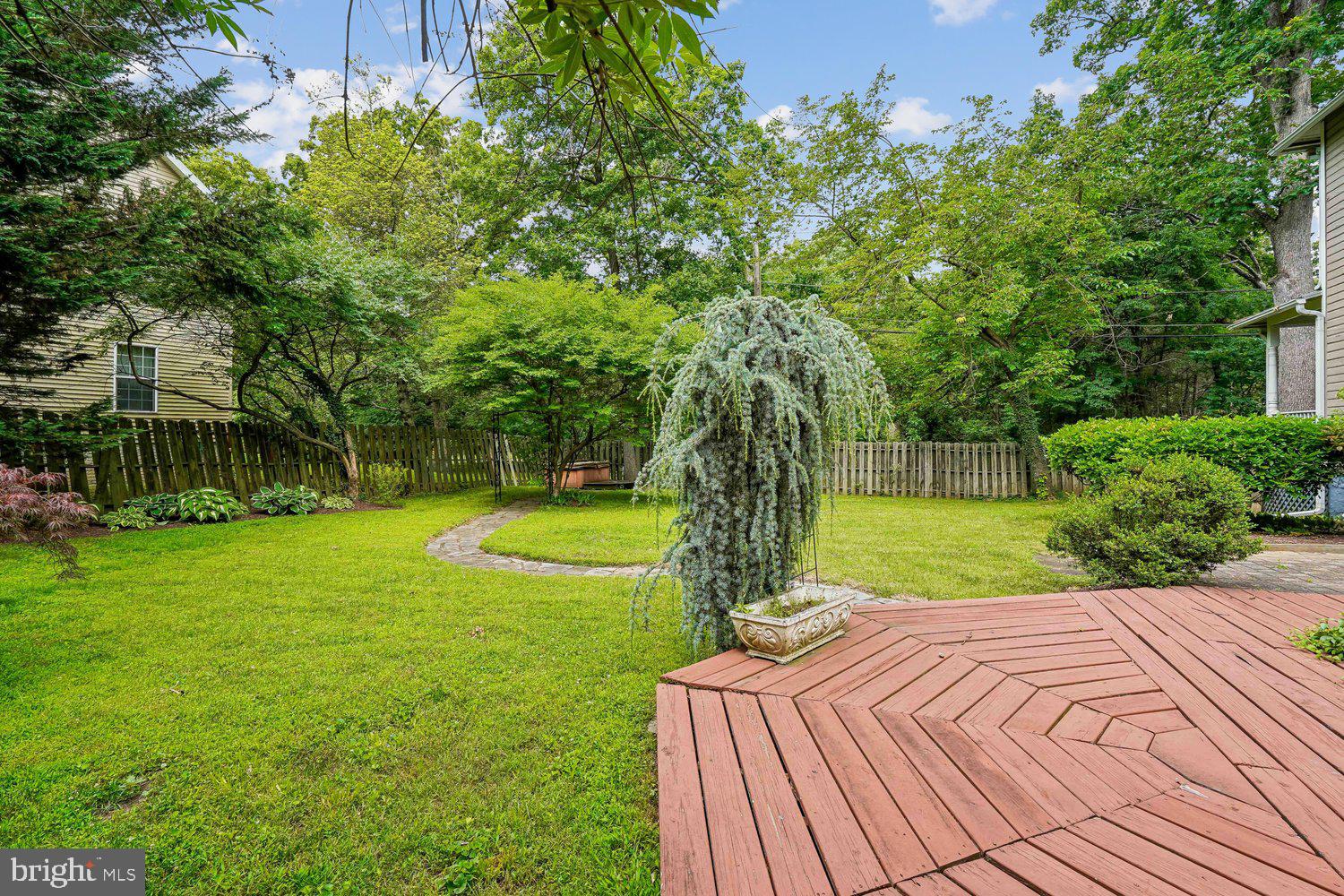 16 Maple Avenue Washington Grove, MD 20880 - Photo 6 of 58 Lush garden retreat with winding pathways.