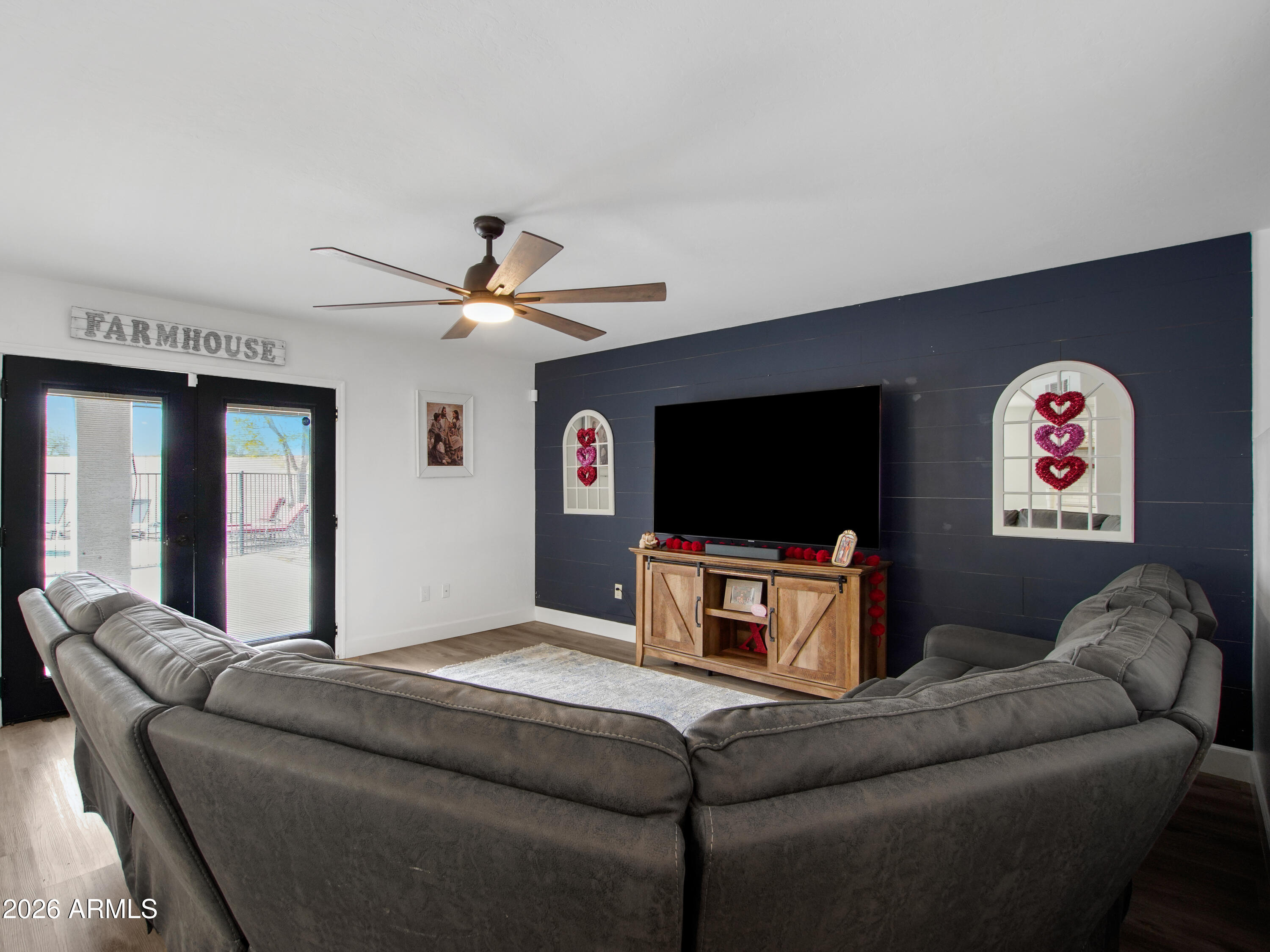 1960 South Portland Court Gilbert, AZ 85295 - Photo 12 of 53 a living room with furniture and a flat screen tv