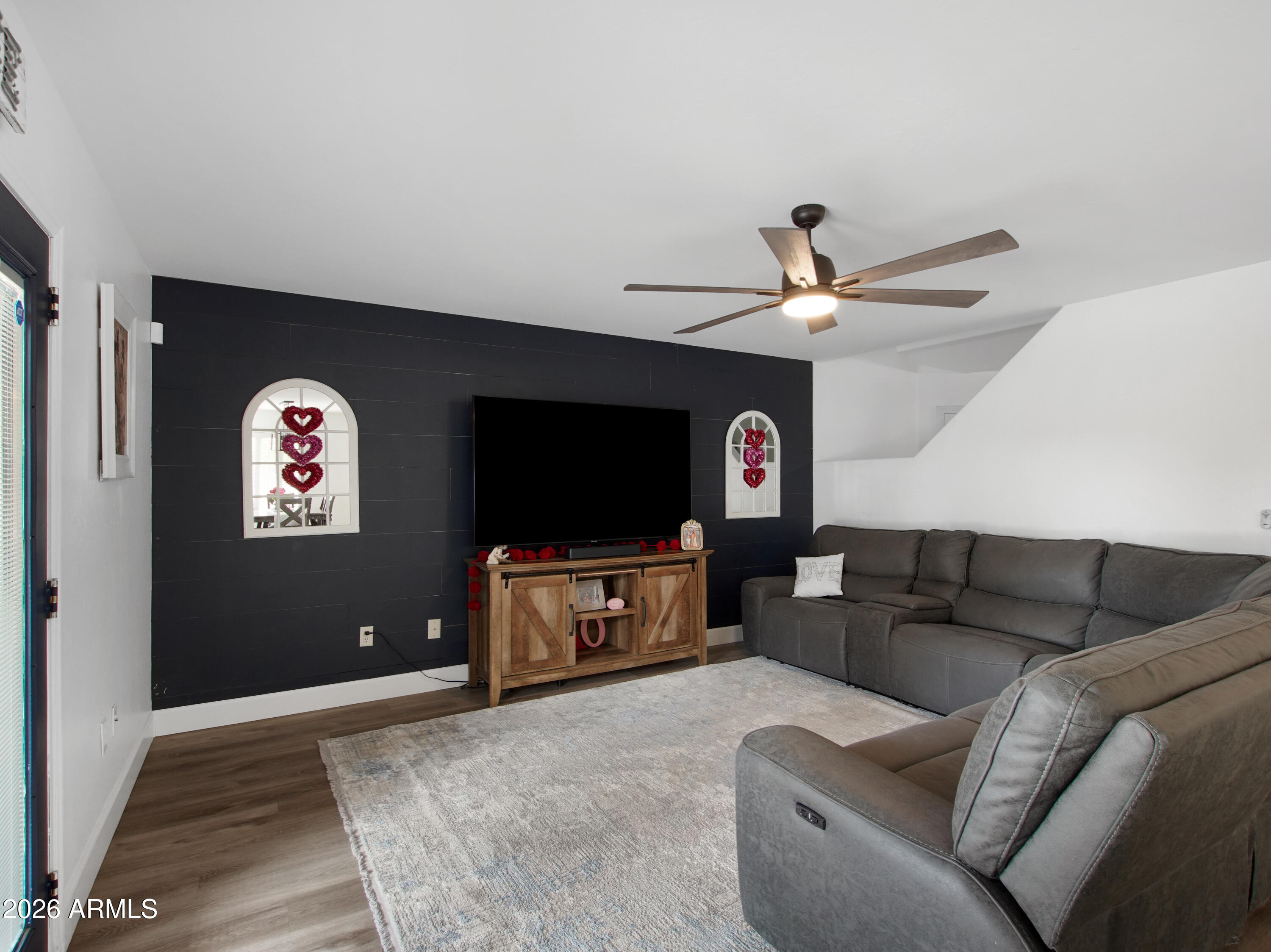 1960 South Portland Court Gilbert, AZ 85295 - Photo 13 of 53 a living room with furniture and a flat screen tv