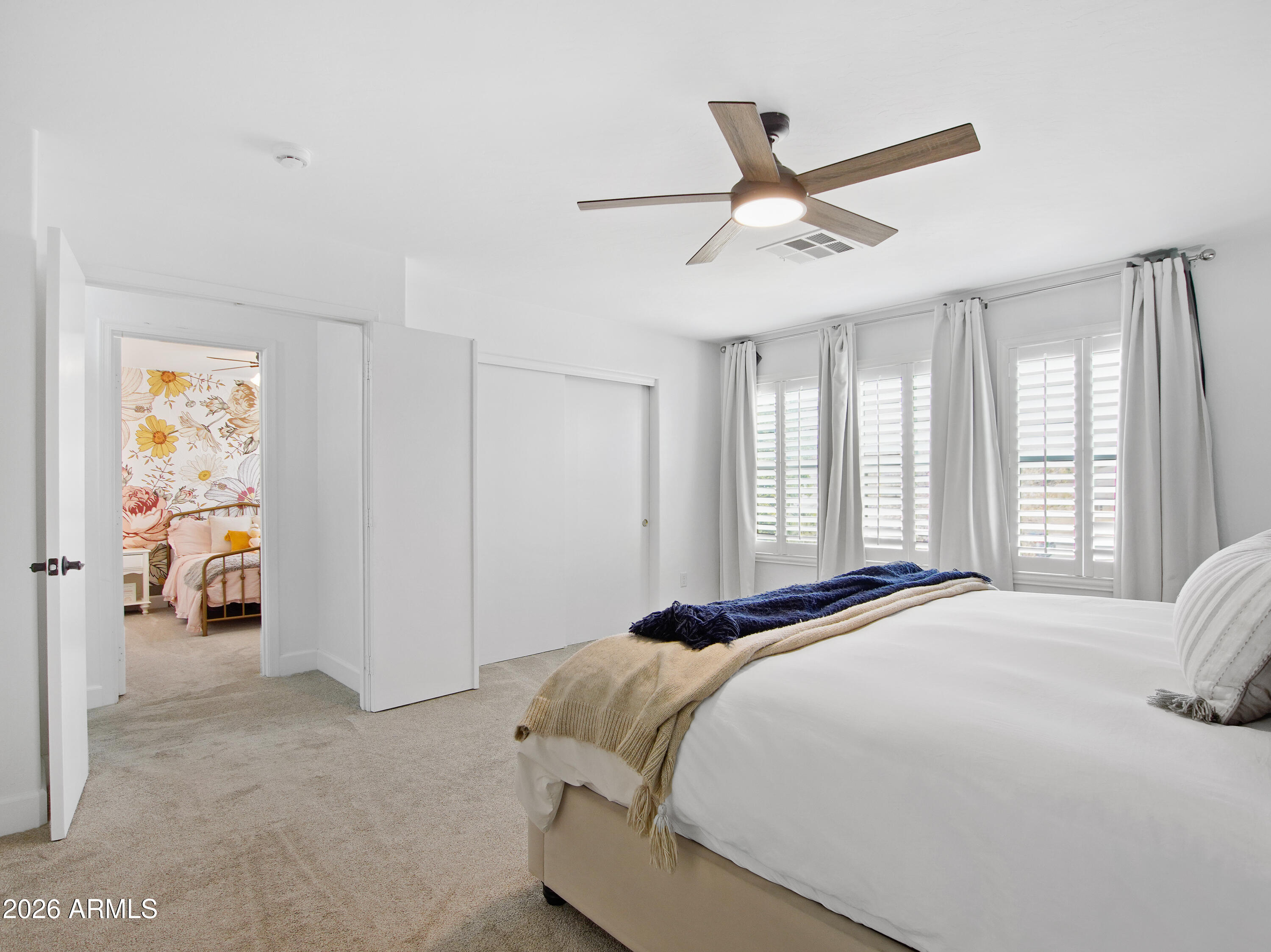 1960 South Portland Court Gilbert, AZ 85295 - Photo 30 of 53 a bedroom with a bed and window