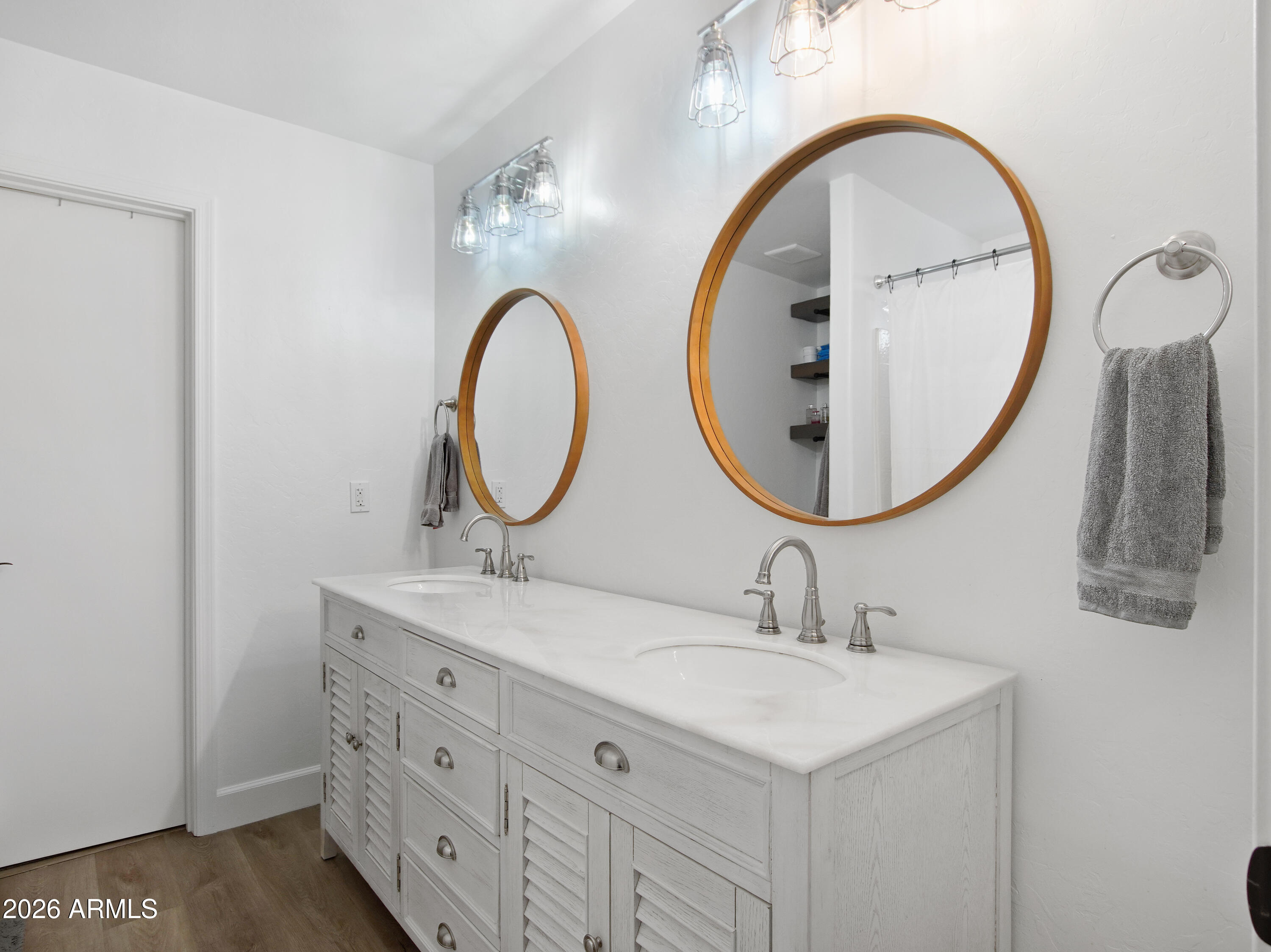 1960 South Portland Court Gilbert, AZ 85295 - Photo 32 of 53 a bathroom with a sink and a mirror