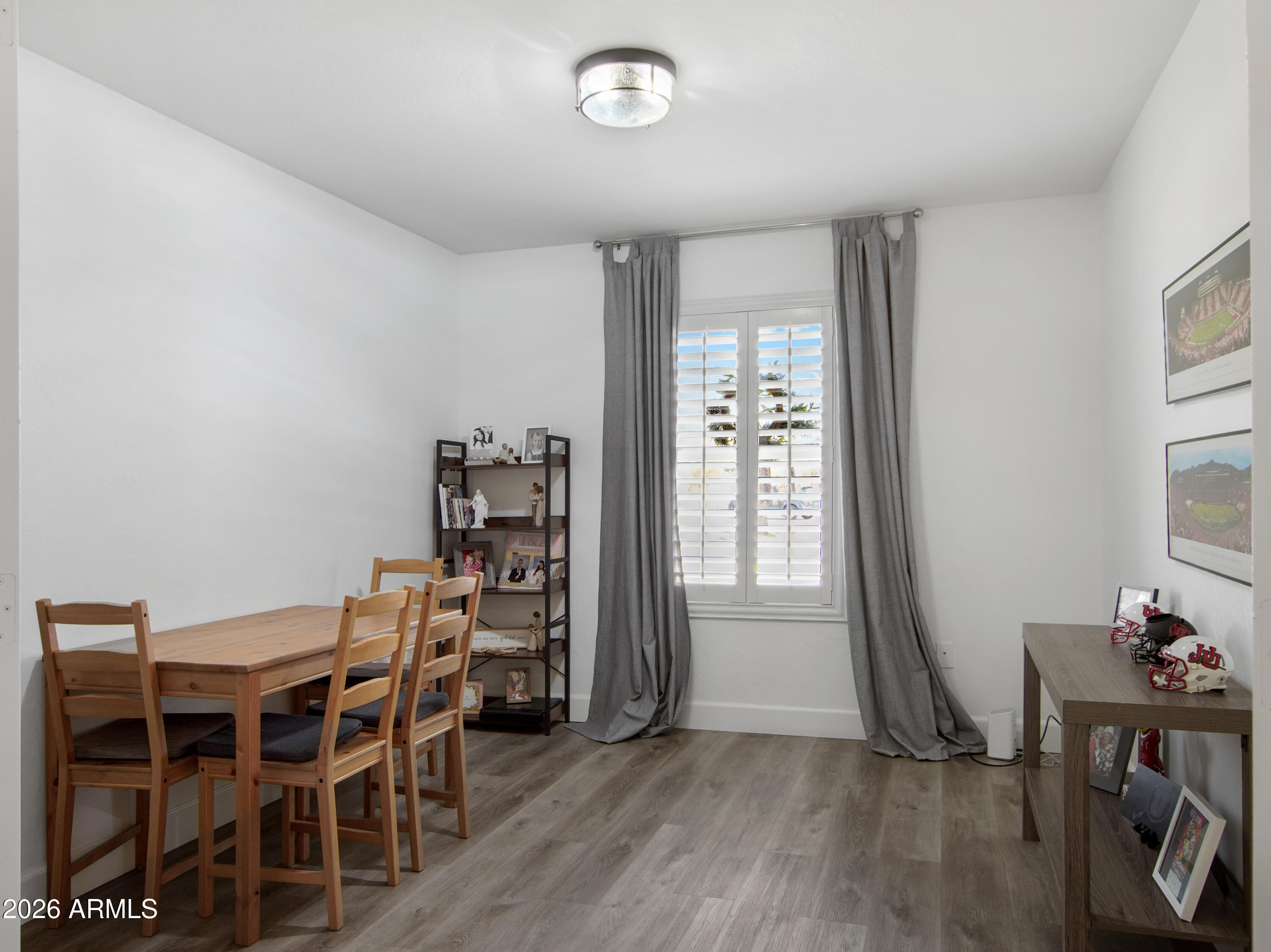 1960 South Portland Court Gilbert, AZ 85295 - Photo 7 of 53 a view of a workspace with furniture and a window