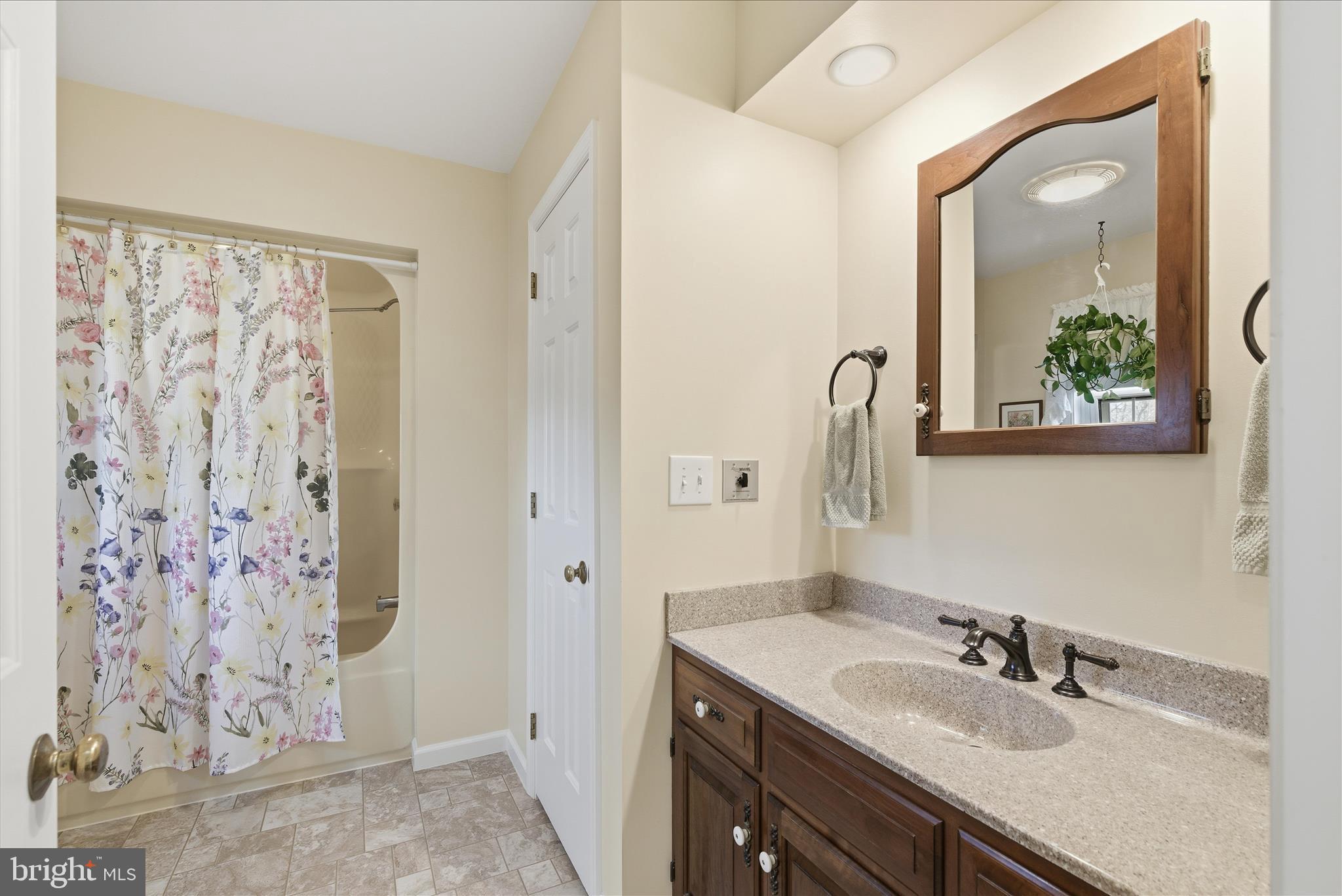 546 Hi View Drive Lititz, PA 17543 - Photo 35 of 65 a bathroom with a granite countertop sink a mirror and a shower