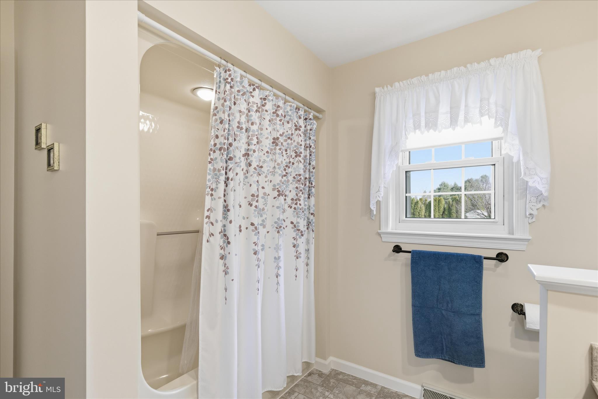 546 Hi View Drive Lititz, PA 17543 - Photo 44 of 65 a bathroom with a window and a shower