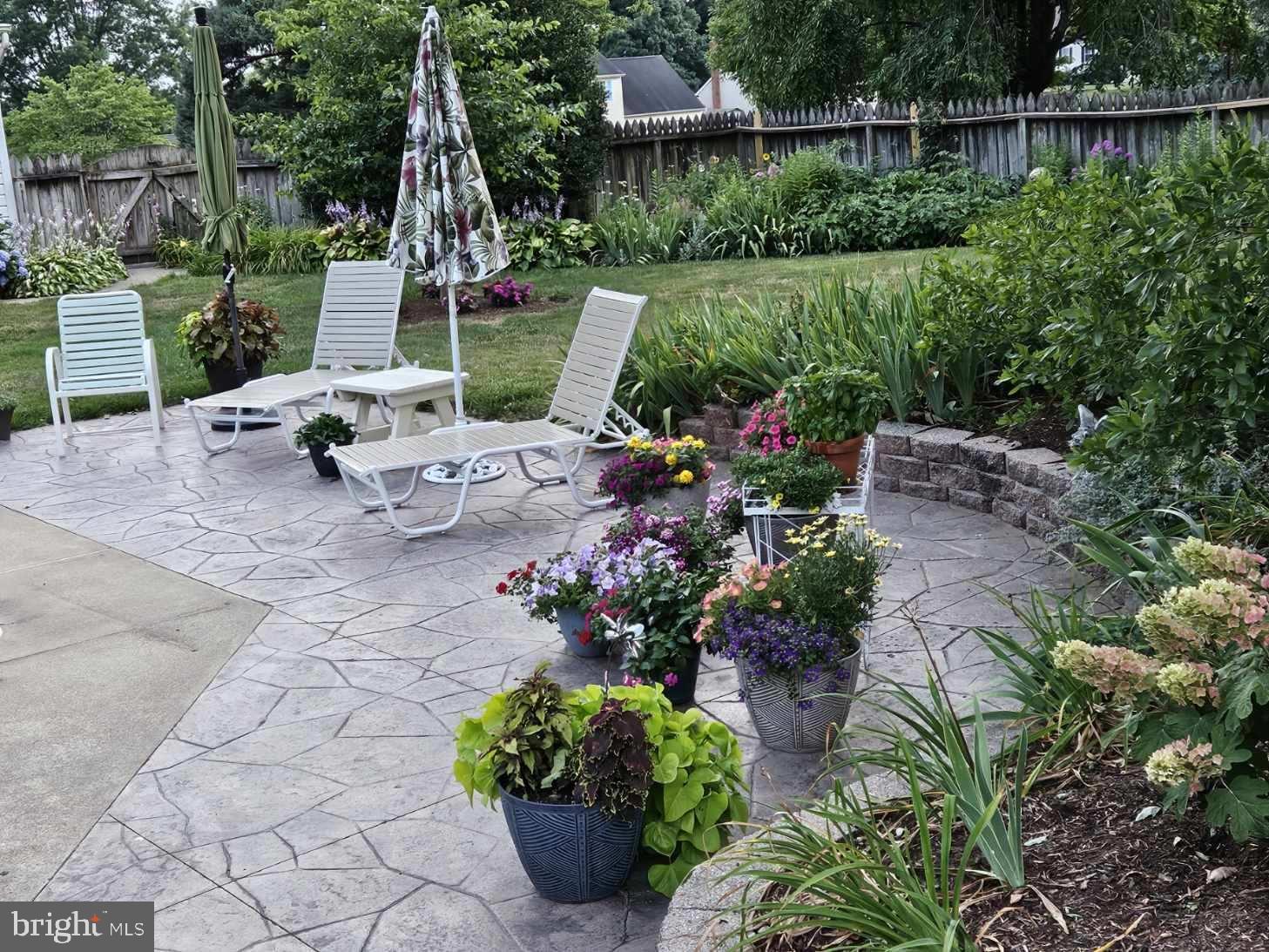 546 Hi View Drive Lititz, PA 17543 - Photo 63 of 65 Lush garden oasis with vibrant blooms.