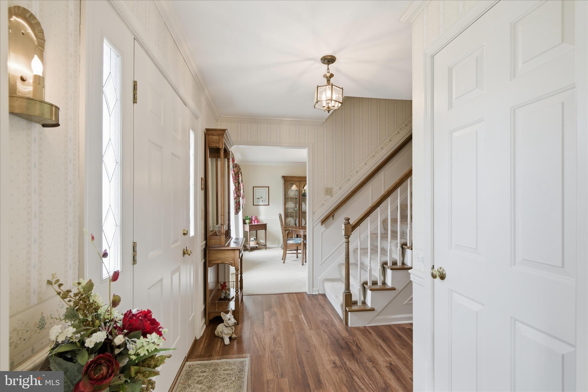 546 Hi View Drive Lititz, PA 17543 - Photo 8 of 65 a view of entryway with wooden floor and stairs