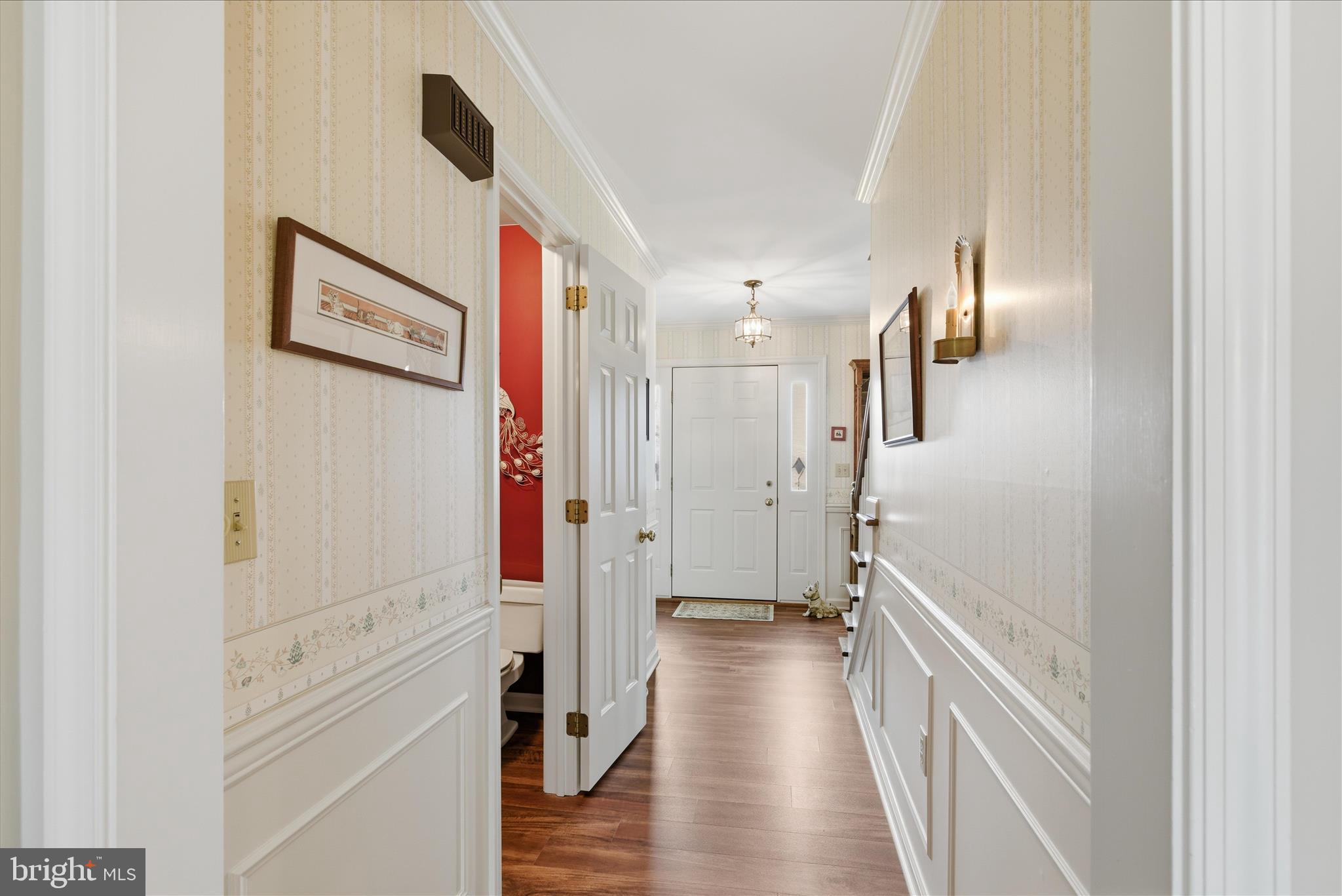 546 Hi View Drive Lititz, PA 17543 - Photo 10 of 65 a view of a hallway with wooden floor and staircase