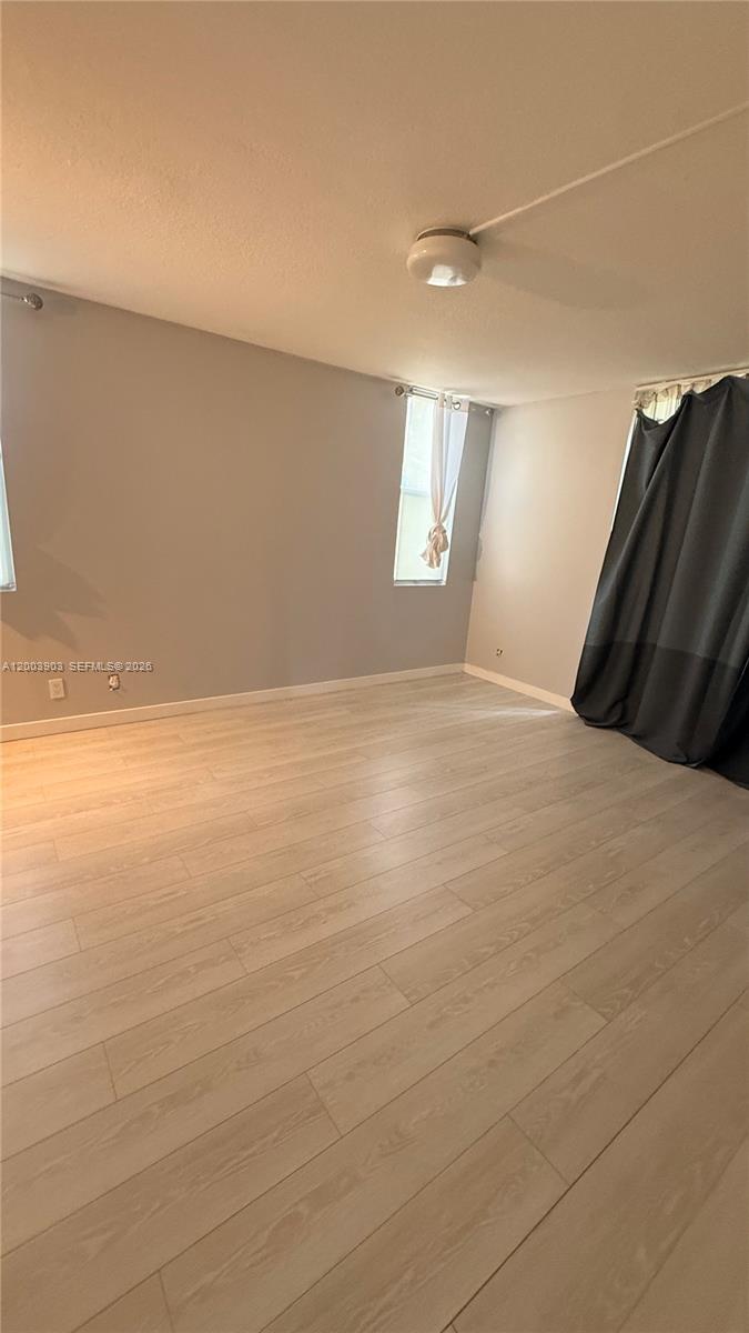 821 Lyons Road, Unit 21102 Coconut Creek, FL 33063 - Photo 15 of 17 a view of an empty room