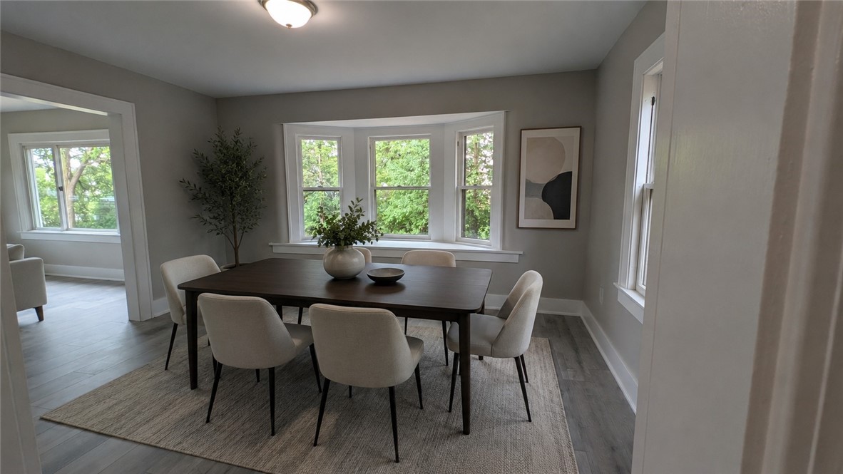 22 Cherry Road Gates, NY 14624 - Photo 9 of 31 Dining room staged with AI