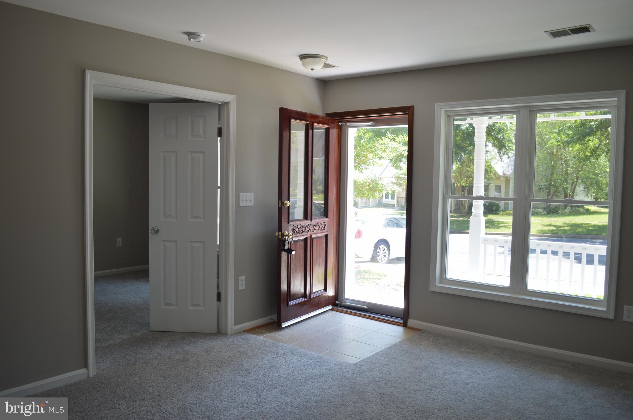 934 Riversedge Circle Annapolis, MD 21401 - Photo 2 of 25 a view of empty room with floor to ceiling window