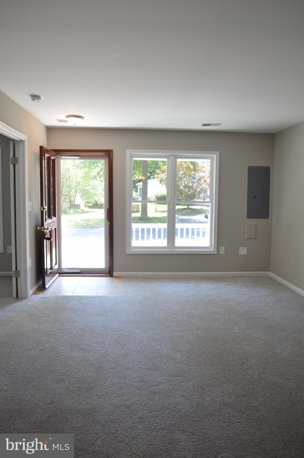 934 Riversedge Circle Annapolis, MD 21401 - Photo 3 of 25 a view of an empty room with a window