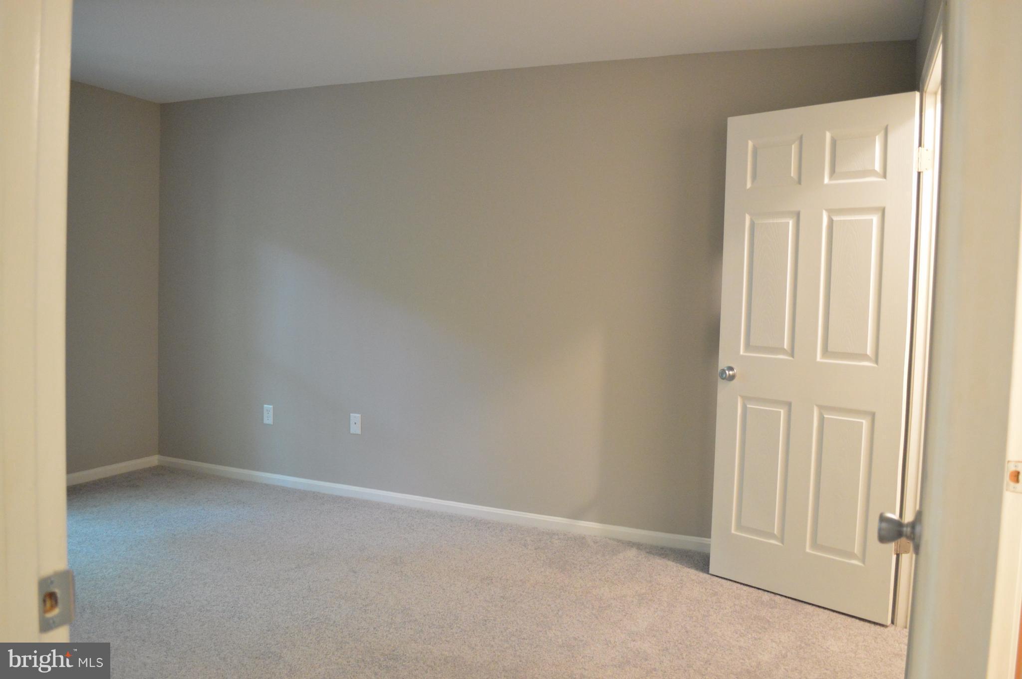 934 Riversedge Circle Annapolis, MD 21401 - Photo 21 of 25 an empty room with windows